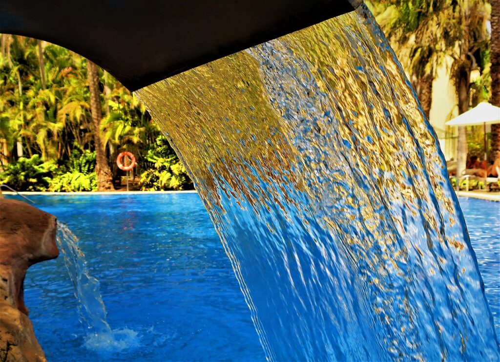 Swimming pool water feature maintenance