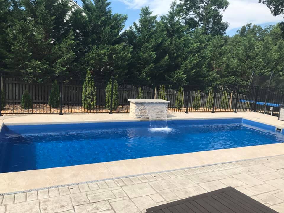 Swimming pool water feature construction near Richmond Virginia